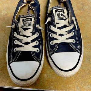 Navy blue womens size 8 converse sneakers.